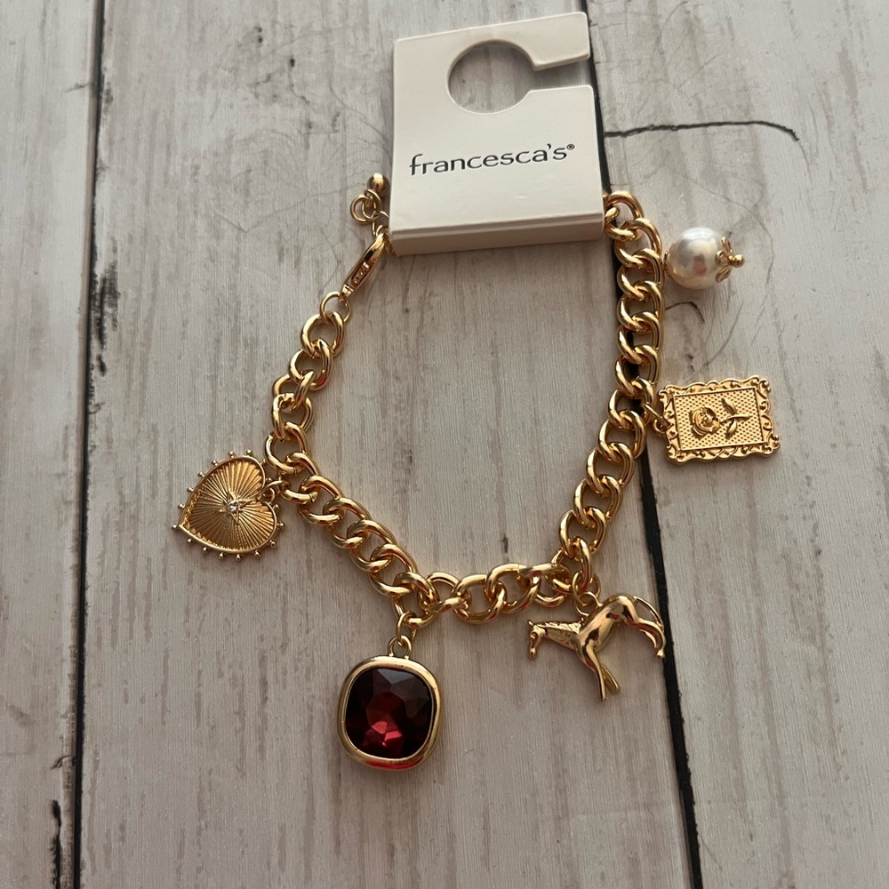 Francesca's Collections Gold Bracelet with Red Gem and Charms